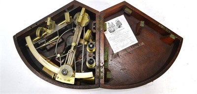 Lot 1032 - A Brass Vernier Sextant by Hughes, London, with silvered vernier and scale, wooden handle,...