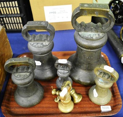 Lot 1035 - A Set of Twelve Victorian Bronze and Brass Bell Weights by De Grave, London, includes 56lbs and...