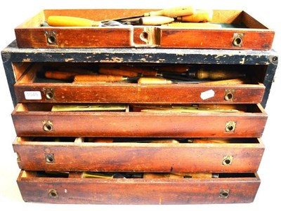 Lot 1045 - A Collection of Woodworking Chisels and Gouges, approximately sixty with wooden handles,...