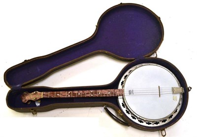 Lot 1050 - An American Tenor Banjo 'Maybell', with faux red pearl body, chrome tension brackets, white plastic