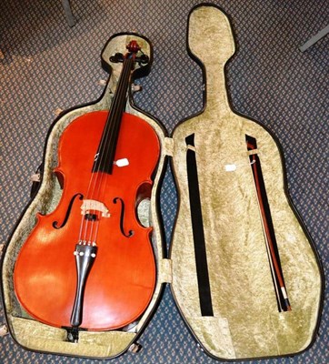 Lot 1056 - A 19th Century German Violoncello, no label, with a 764mm two piece back, ebony tuning pegs,...