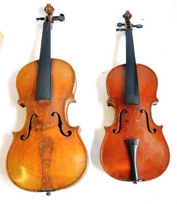 Lot 1081 - Two 19th Century German Violins, one full size 'Copy of a Stainer', the other half size with no...