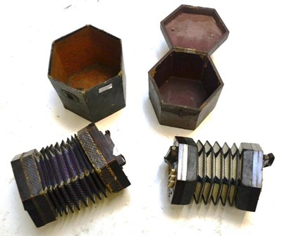 Lot 1092 - A Thirty Key Anglo System Concertina, serial number 106760, with fretwork rosewood ends, bone...