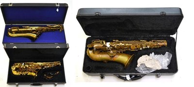 Lot 1096 - A Brass Tenor Saxophone by JTL Paris, in a fitted case; A Brass Alto Saxophone by Lazer, in a...