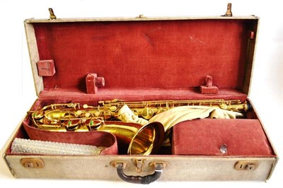 Lot 1102 - A Pennsylvania Special Brass Tenor Saxophone, serial number 268413, with engraved decoration to...