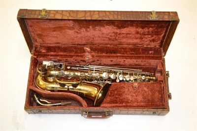 Lot 1114 - A Brass 'Parisian' Alto Saxophone for F.E Olds & Sons, with mother of pearl inset keys, in a fitted