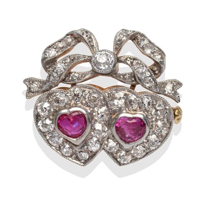 Lot 268 - ~ A Twin Heart Brooch, heart shaped rubies within borders of old cut diamonds, with a diamond...