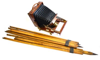 Lot 1146 - A Mahogany and Brass Folding Field Camera, with double extension tapered black bellows,...