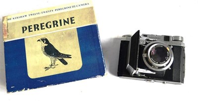 Lot 1149 - A Kershaw Peregrine III Folding Rollfilm Camera, No.4/26056, with leather covered chrome body,...