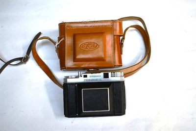 Lot 1152 - A Kershaw Peregrine III Folding Rollfilm Camera, No.4/25526, with leather covered chrome body,...