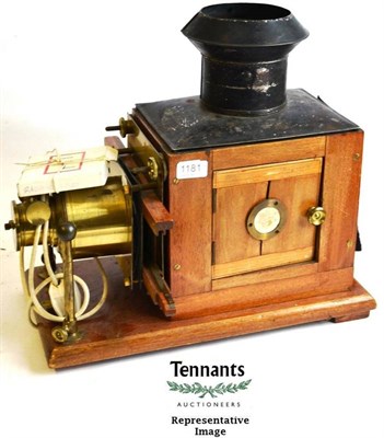 Lot 1181 - A Mahogany and Brass Magic Lantern, with tinplate hood, hinged side panels, converted to...