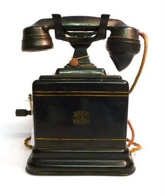 Lot 1005 - A Siemens of London Black Tinplate Model 3320 Telephone, with gilt decoration, winding handle,...