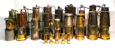 Lot 1007 - A Collection of Fifteen Miners Safety Lamps, including a Patterson with corrugated tin hood,...