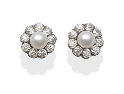 Lot 275 - A Pair of Cultured Pearl and Diamond Cluster Earrings, the pearls within borders of nine old...