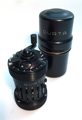 Lot 1034 - A Curta Type 1 Calculator by Contina AG Mauren, No.41681, with black enamelled cylindrical body, in