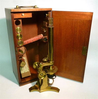 Lot 1054 - A 19th Century Lacquered Brass Monocular Compound Microscope by Baker, 24 High Holborn, London,...