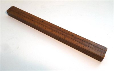 Lot 1071 - An 18th Century Excise Gaugers 12inch Boxwood Slide Rule by Cook, inscribed 'Cook Maker to the Hon.