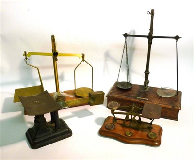 Lot 1076 - Four Sets of Scales, comprising a Fairbanks cast iron steelyard counter scale, an Arnold...