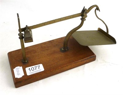 Lot 1077 - A 19th Century Brass Steelyard Postal Balance, the brass arm with a scale from 1/2oz to 8oz, single