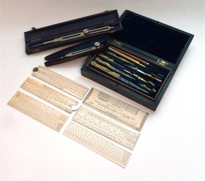 Lot 1092 - Drawing Instruments and Ivory Rules, comprising two ivory sectors, three ivory scale rules,...