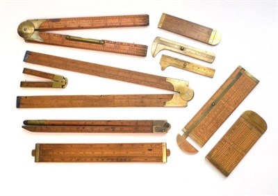 Lot 1093 - Ten Boxwood and Brass Rules and Gauges, including a vernier gauge by W & J George, Birmingham,...