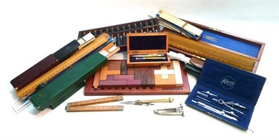 Lot 1094 - A Collection of Rules, including a mahogany cased set of ten boxwood rules by Stanley, London,...