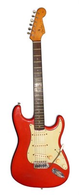 Lot 1117 - A 1962 Fender Stratocaster, with rosewood fingerboard, maple neck, three single coil pickups,...