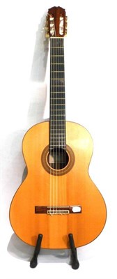 Lot 1119 - A Francisco Serrano Classical Guitar, with cedar neck, ebony fingerboard, spruce top and...