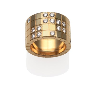 Lot 293 - An 18 Carat Gold Diamond Set Band Ring, by Cartier, the broad band modelled as four rows of...