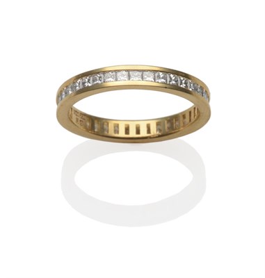 Lot 295 - An 18 Carat Gold Diamond Eternity Ring, the princess cut diamonds in a yellow channel setting,...