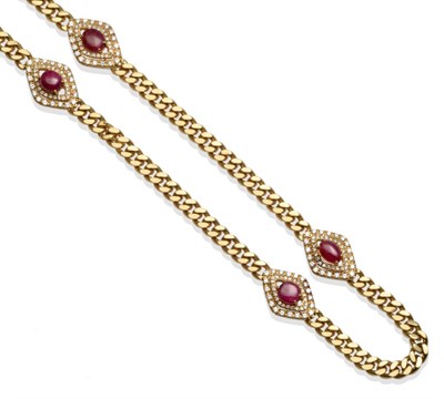 Lot 303 - ~ A Ruby and Diamond Set Chain, the long curb link chain with four ruby and diamond clusters at...