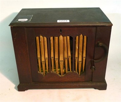 Lot 1224 - A Mahogany Cased Barrel Organ, with a 23cm wooden barrel, serpentine winding arm, eleven gilt...