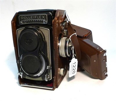 Lot 1228 - A Rolleiflex T Twin Lens Reflex Camera, serial number T2134735, with grey leather covered body,...