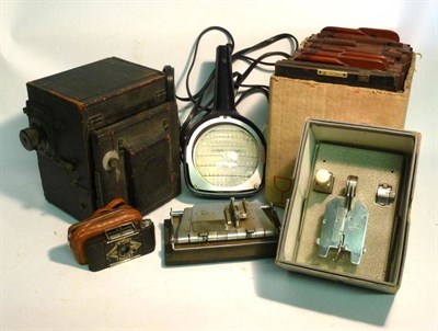 Lot 1234 - Cameras and Binoculars, including two mahogany and brass folding field cameras, reflex camera...