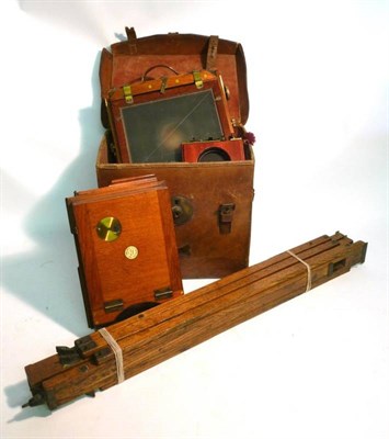 Lot 1242 - A Mahogany and Brass Folding Field Camera Outfit by G.Mason, Leeds, with double extension...