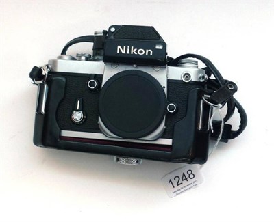 Lot 1248 - A Nikon F2 Photomic 35mm SLR Camera Body, in chrome, serial number 7862884, in a leather case