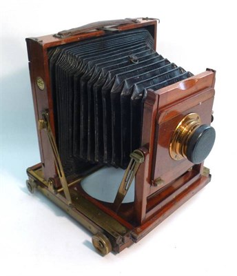 Lot 1262 - A Mahogany and Brass 'Imperial' Folding Field Camera by Thornton-Pickard, 1/2 plate size, with...