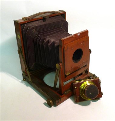 Lot 1263 - A Mahogany and Brass Folding Field Camera 'The Fairfield' by Hora & Co., London, 1/2 plate...