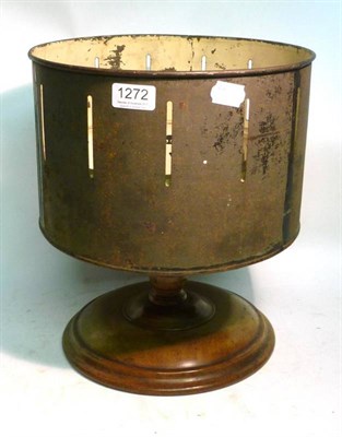 Lot 1272 - A 19th Century Tinplate Zoetrope, on a turned walnut base, with ten coloured and black and...