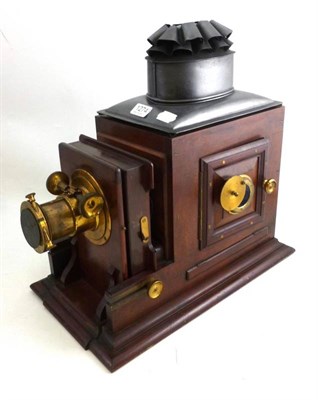 Lot 1274 - A 19th Century Mahogany 'Lecture' Magic Lantern, with tinplate hood, hinged side panels with...