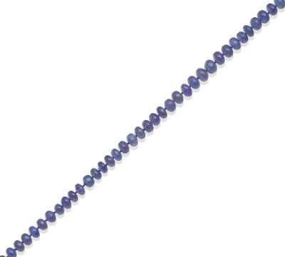 Lot 315 - A Tanzanite Bead Necklace, graduated tumbled round beads knotted to a grooved clasp, length 50cm