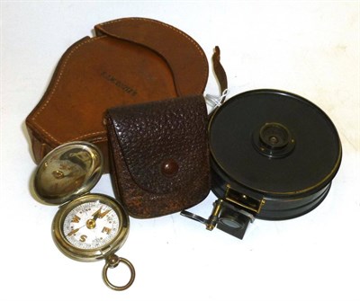 Lot 1020 - An Oxidised Brass Surveyors Pocket Compass by Elliott Bros, Strand, London, with green card...
