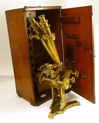 Lot 1027 - A 19th Century Lacquered Brass Binocular Compound Microscope, with rack and pinion coarse and...