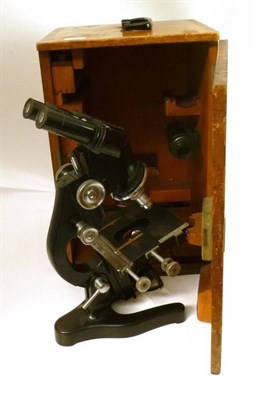 Lot 1032 - A Black Enamelled Binocular Compound Microscope by Ernst Leitz, Wetzlar, with rack and pinion...