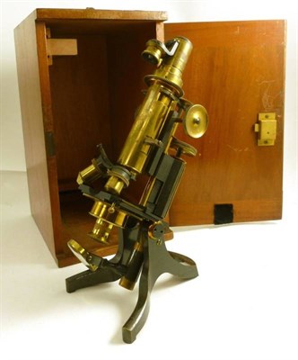 Lot 1044 - A Lacquered Brass and Black Enamelled Monocular Compound Microscope by J.Swift & Son, 81...