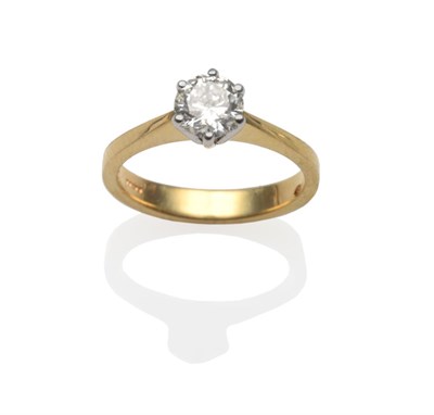 Lot 329 - An 18 Carat Gold Diamond Solitaire Ring, the round brilliant cut diamond in a white claw...