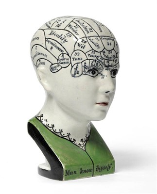 Lot 1067 - A 19th Century Staffordshire Pearlware Phrenology Head, the skull with raised and rounded brain...