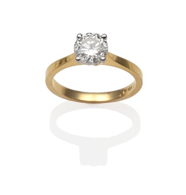 Lot 331 - An 18 Carat Gold Diamond Solitaire Ring, the round brilliant cut diamond in a white four claw...