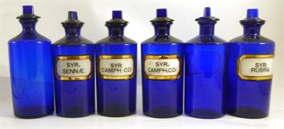 Lot 1070 - Six 19th Century Cobalt Blue Chemists Rounds, all with stoppers, four with verre eglomise...