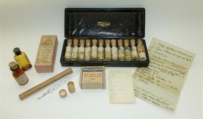 Lot 1076 - A Leather Cased Homeopathy Set, containing twelve bottles with corks and hand written labels,...